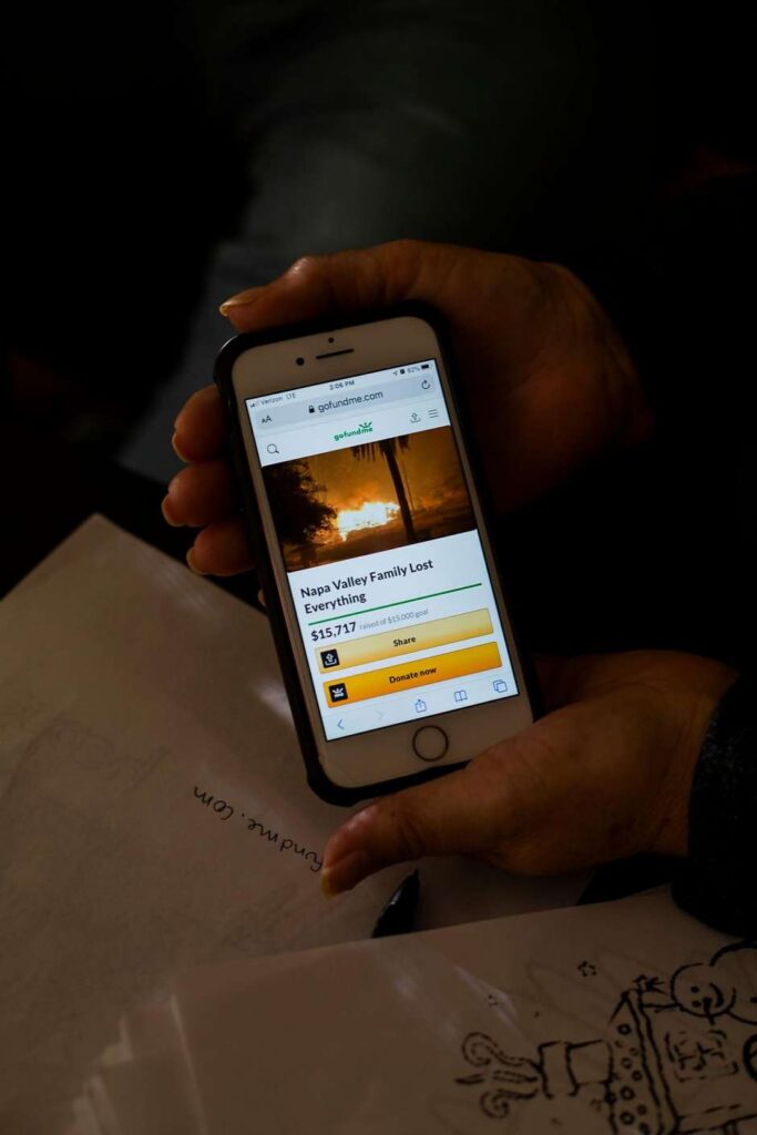 Phone displaying a donation app screen.