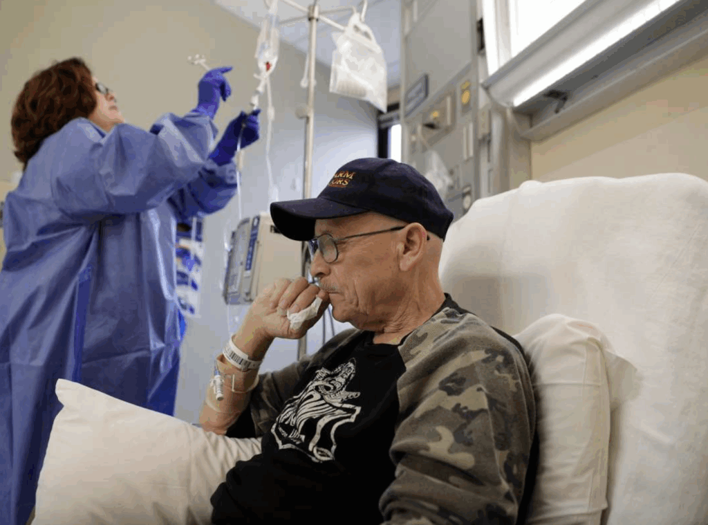 Elderly man at chemotherapy appointment