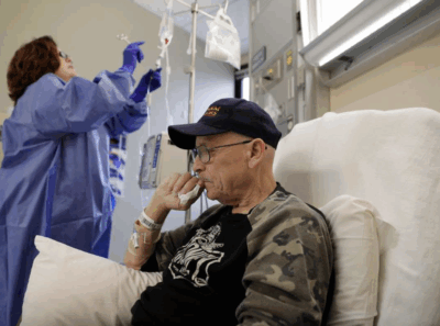 Elderly man at chemotherapy appointment