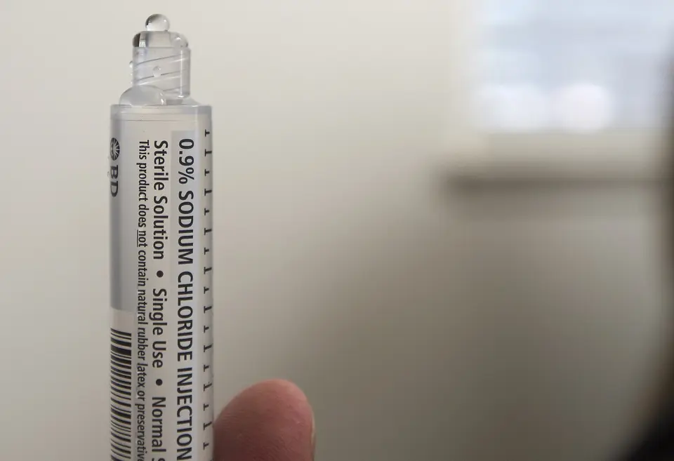 Medication in syringe.